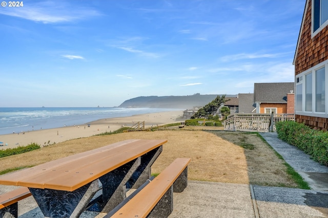 view of water feature with a beach view