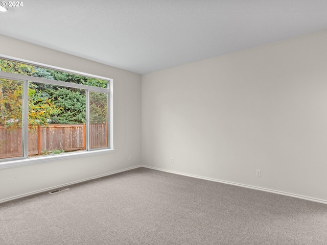 15771 SW Harvester Ln, Sherwood, OR 97140 - carpeted spare room featuring baseboards