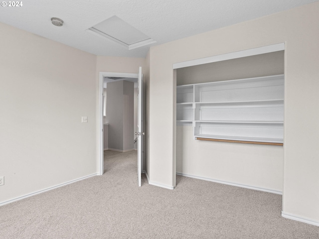 15771 SW Harvester Ln, Sherwood, OR 97140 - unfurnished bedroom featuring carpet flooring, attic access, a closet, and baseboards