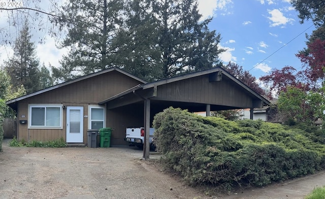 view of front of home with an attached carport