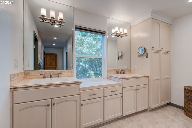 bathroom with tile patterned floors and vanity