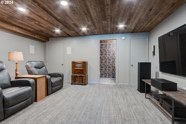 sitting room featuring carpet floors and wood ceiling