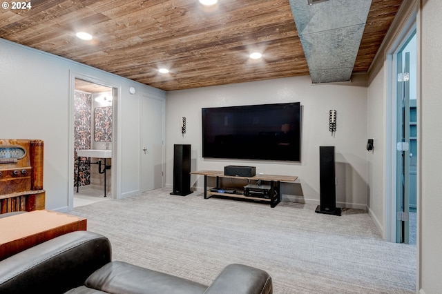 carpeted living room featuring wood ceiling