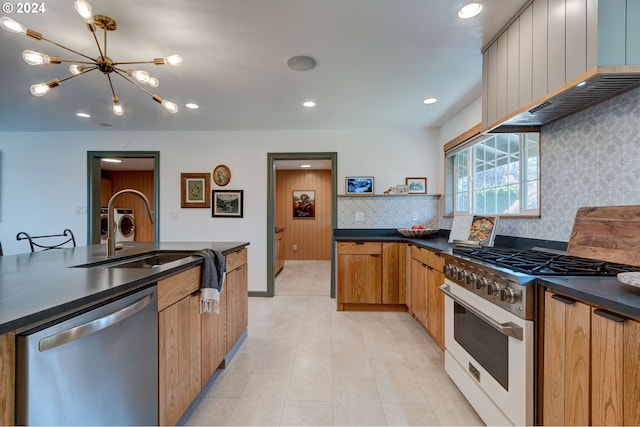 kitchen featuring sink, an inviting chandelier, high end white range oven, stainless steel dishwasher, and backsplash