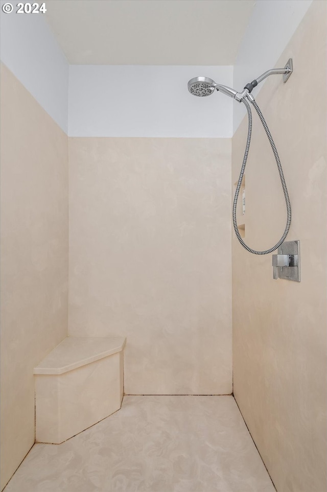 bathroom featuring walk in shower