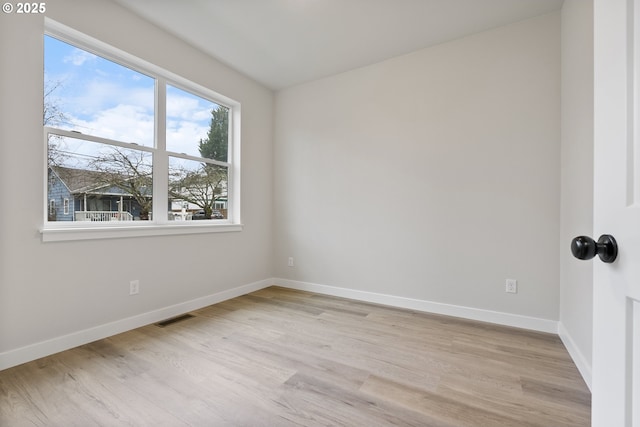 empty room featuring light wood-type flooring