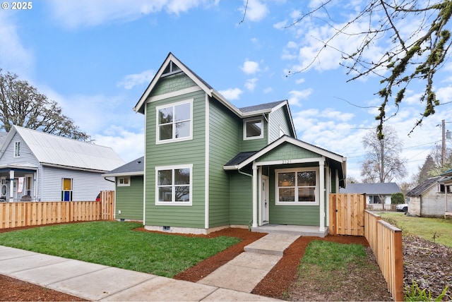 view of front of home featuring a front lawn