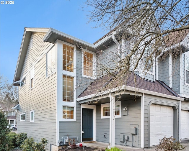 view of front of property with a garage