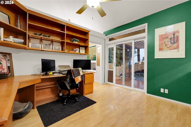 home office with ceiling fan and light hardwood / wood-style flooring