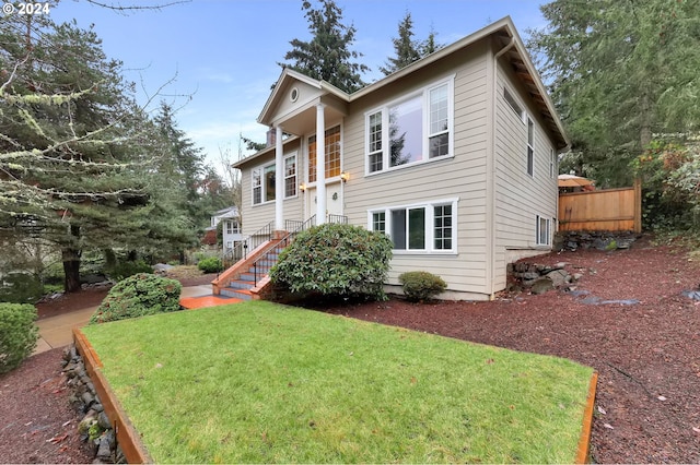 bi-level home featuring a front yard