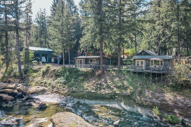 view of yard with a wooded view