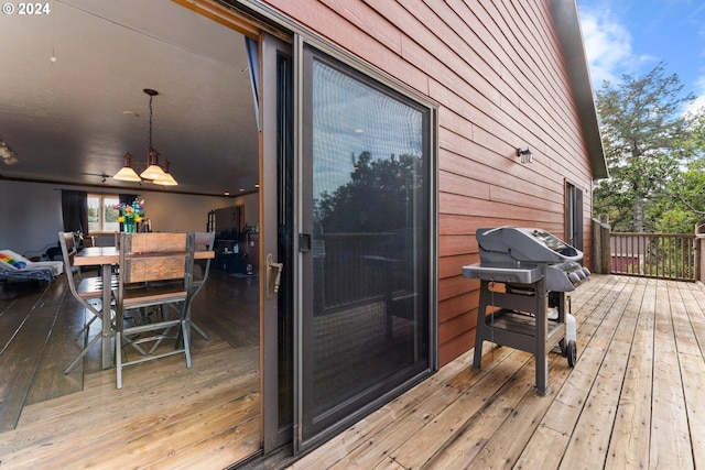 wooden terrace with grilling area