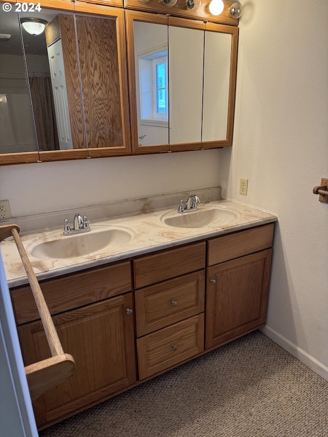 bathroom featuring tile patterned floors and vanity