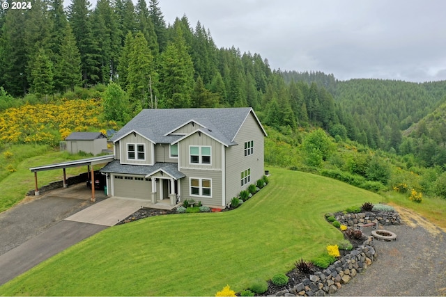 54830 Mcdonald Rd, Vernonia, OR 97064 - view of front of property with a carport, a garage, and a front yard