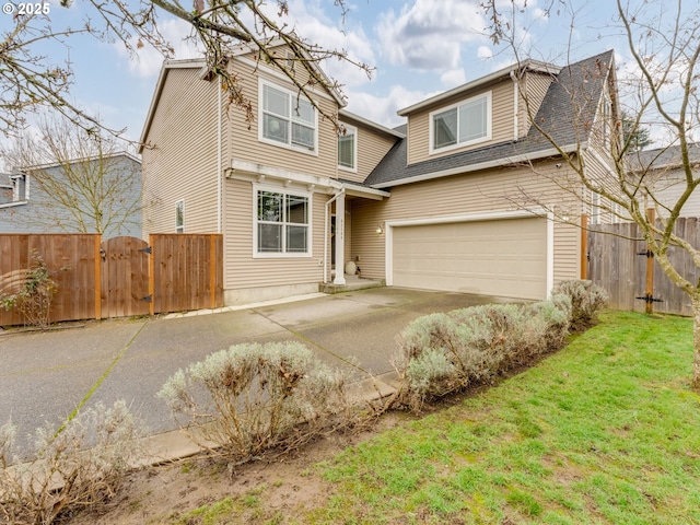 view of front facade with a front yard and a garage