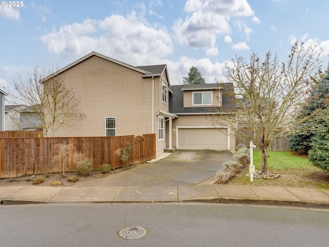 view of front of home with a garage