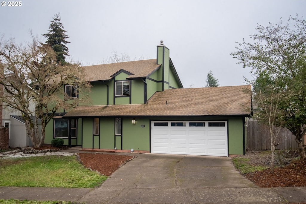 tudor home with a garage