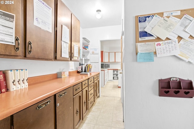 kitchen featuring light countertops