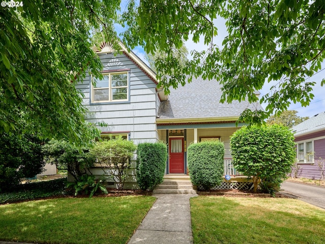 view of front of home with a front yard