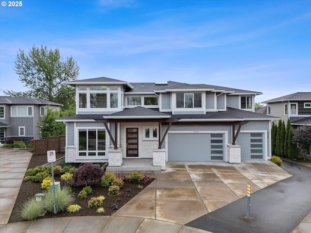 13560 SW Whitworth Ct, Beaverton, OR 97005 - prairie-style house featuring an attached garage, driveway, and roof with shingles