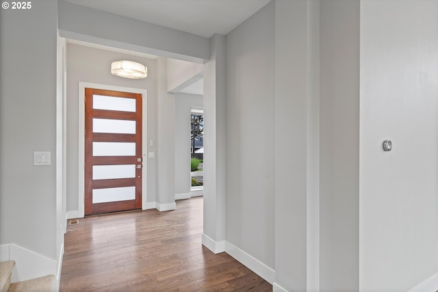 13560 SW Whitworth Ct, Beaverton, OR 97005 - foyer featuring dark wood finished floors and baseboards