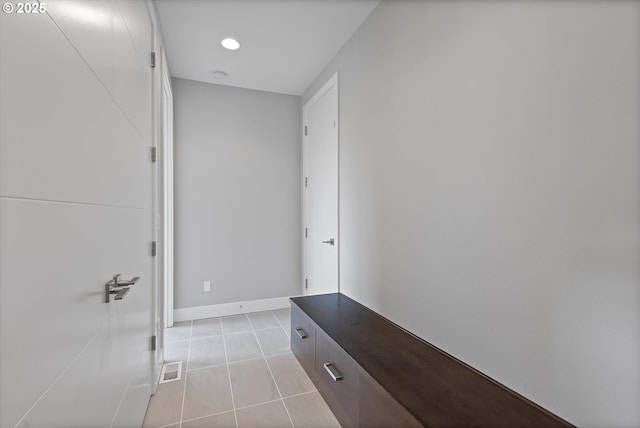 13560 SW Whitworth Ct, Beaverton, OR 97005 - corridor featuring light tile patterned floors, baseboards, and recessed lighting