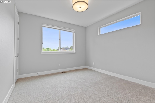 13560 SW Whitworth Ct, Beaverton, OR 97005 - carpeted empty room featuring baseboards