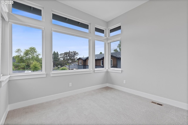 13560 SW Whitworth Ct, Beaverton, OR 97005 - carpeted empty room with baseboards