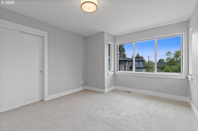13560 SW Whitworth Ct, Beaverton, OR 97005 - empty room featuring baseboards and carpet
