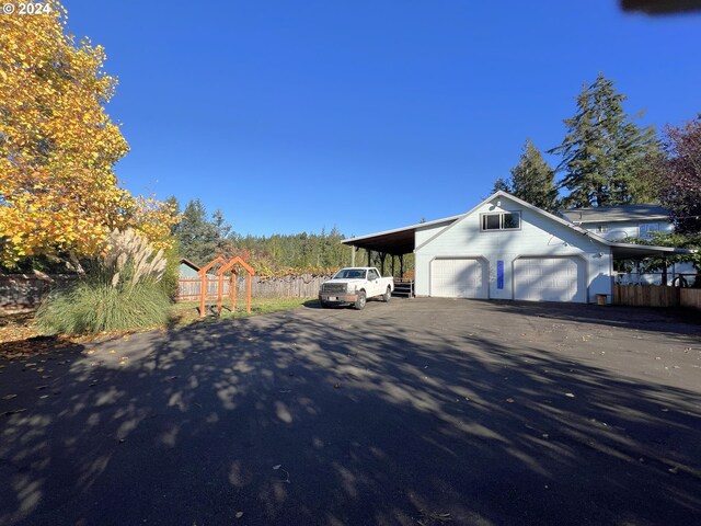 view of property exterior with a carport