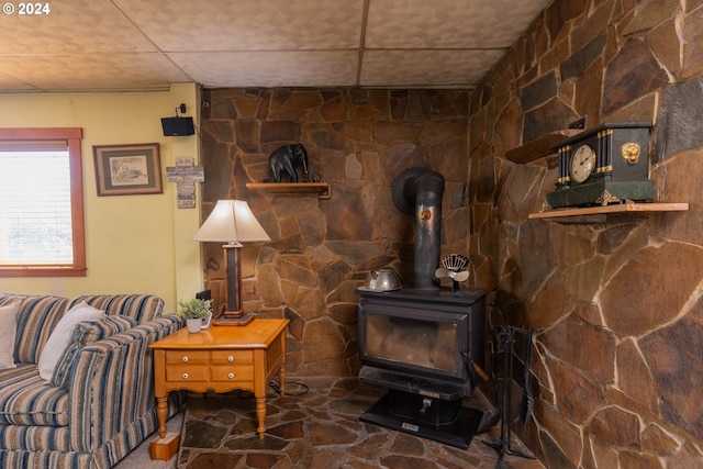 living room with a wood stove