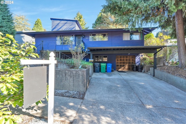 view of front of home featuring a carport