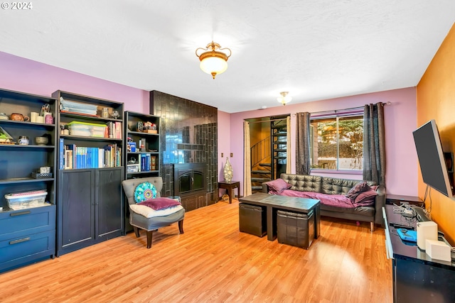 living room with light hardwood / wood-style flooring