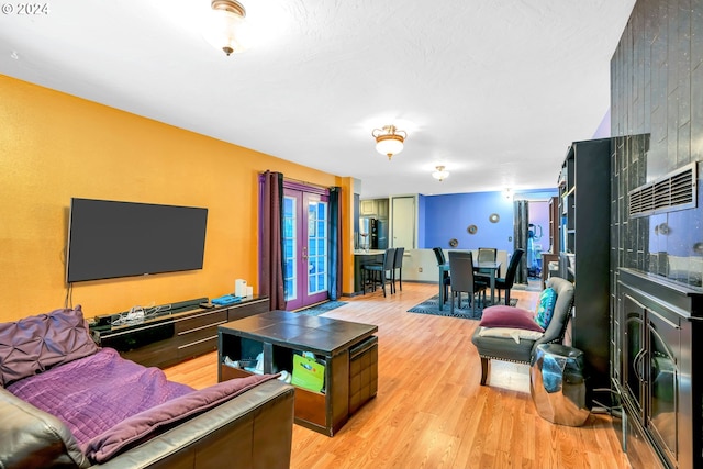 living room with light hardwood / wood-style floors