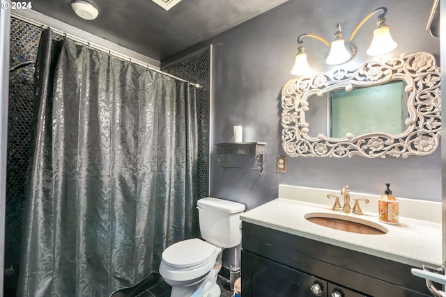 bathroom with vanity, toilet, and a shower with shower curtain