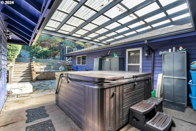 view of patio featuring a hot tub