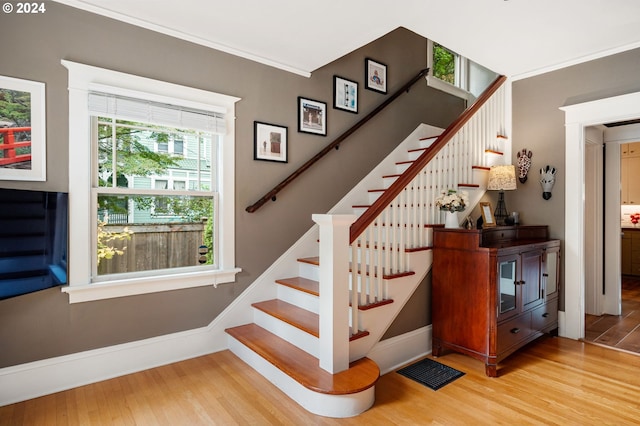 3107 N Rosa Parks Way, Portland, OR 97217 - staircase featuring wood finished floors, healthy amount of natural light, and baseboards