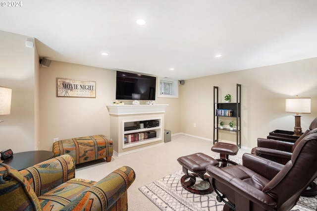 3107 N Rosa Parks Way, Portland, OR 97217 - carpeted living room with a glass covered fireplace, recessed lighting, and baseboards