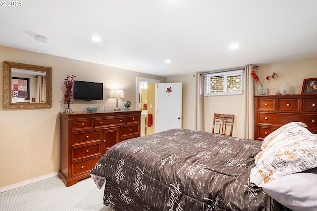 bedroom featuring recessed lighting, light colored carpet, and baseboards