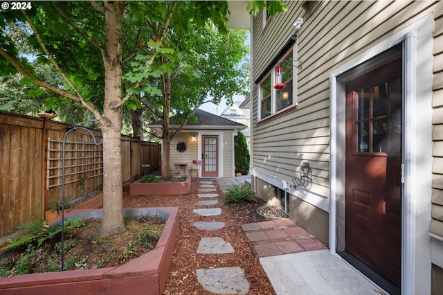 3107 N Rosa Parks Way, Portland, OR 97217 - view of yard featuring a garden and an outbuilding