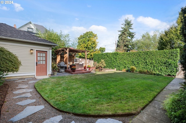 view of yard featuring a patio, a wooden deck, and a pergola