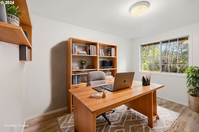 office featuring light hardwood / wood-style flooring