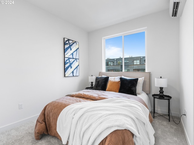 carpeted bedroom featuring a wall mounted air conditioner