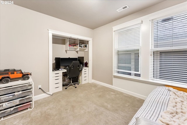 office space featuring light colored carpet