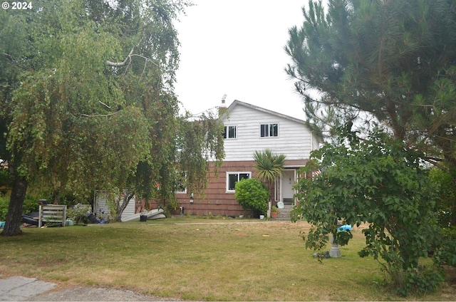 exterior space featuring a lawn