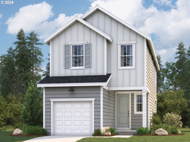 view of front of home featuring a garage and a front lawn