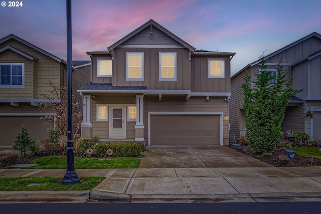 view of front of property featuring a garage