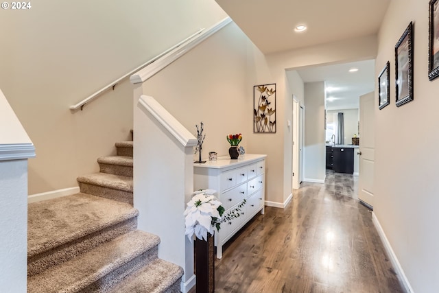 interior space with dark hardwood / wood-style floors