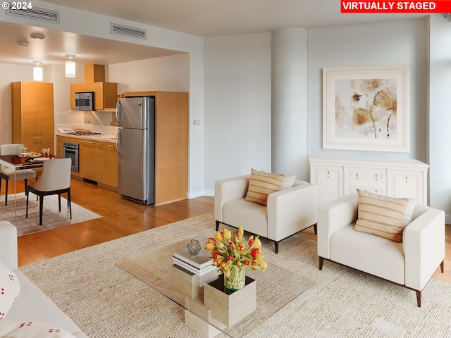 living room featuring light hardwood / wood-style floors