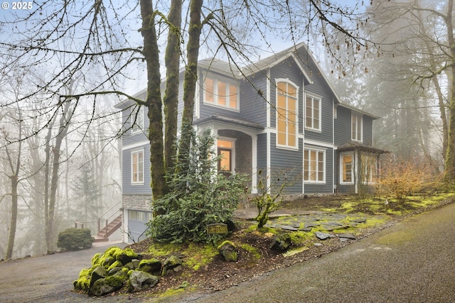 view of property exterior featuring a garage